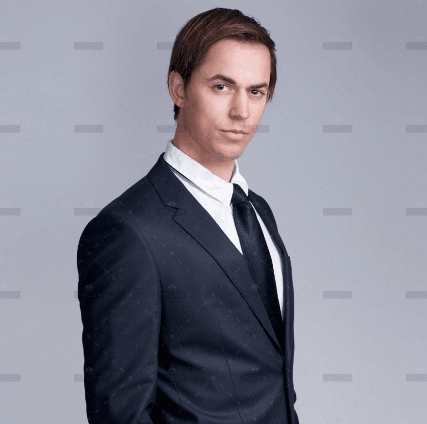 demo-attachment-3389-handsome-young-businessman-standing-against-gray-PFGZN4E-min